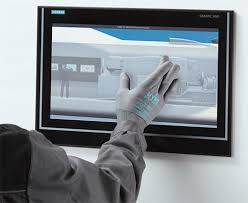 NFI Corp_gloved hand using touch screen_blog