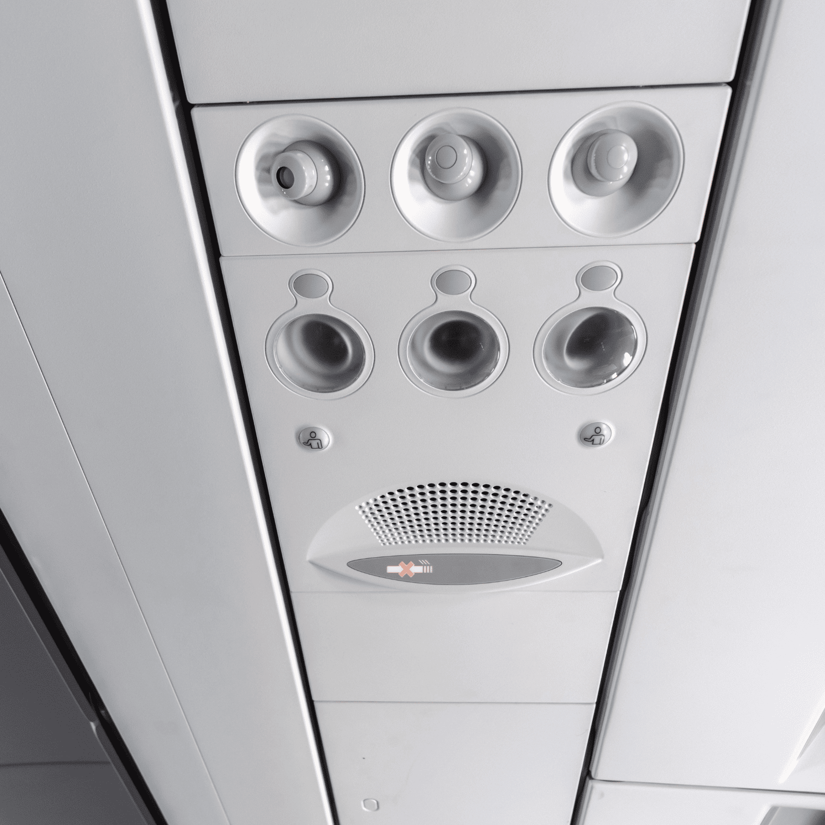 Aircraft cabin overhead panel with no-smoking indicator